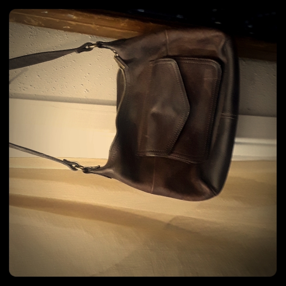 Authentic fossil purse and clutch